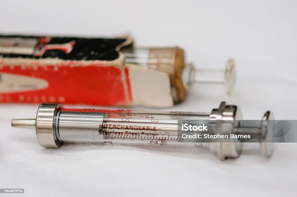 Medical equipment from World War 1 Glass syringe dating from around 1914. 1918 Stock Photo