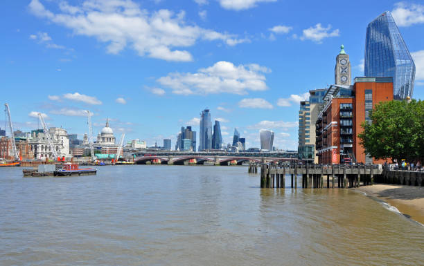 London cityscape and River Thames panorarma London, United Kingdom, July 29, 2019. London cityscape panorama. Includes left to right, St Paul's Cathedral, Cheesegrater and Walkiie Talkie buildings, river Thames southbank Oxo Tower and 1 Blackfriars (the Vase). Shot looking downriver toward Blackfiars Bridge panorarma stock pictures, royalty-free photos & images