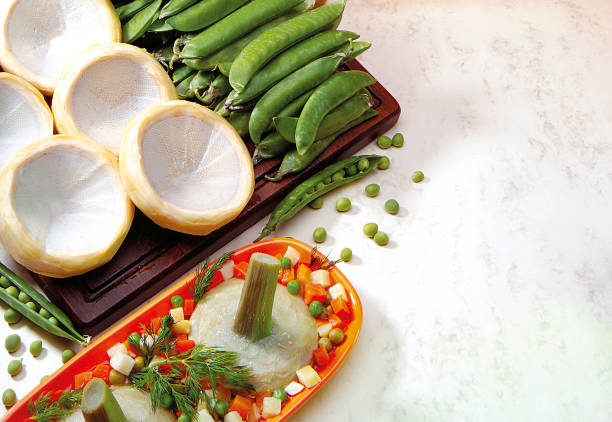 Artichoke preparation with cooked and uncooked olive oil
