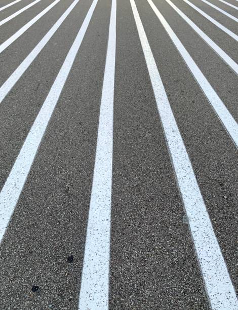 istock Crosswalk Lines in Parking Lot 1165887584