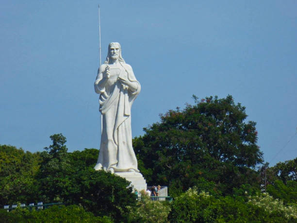 Lubango, Huila Province, Angola: The Statue of Christ the King with his arms outstretched is a religious monument erected at an altitude of 2,100 metres on the Serra da Chela and dedicated to Jesus Christ. It was designed by Civil Engineer Carlos Frazão Sardinha, inspired by the monument to Christ the King in Almada in Portugal, as a symbol of faith and devotion to Christianity. 'Cristo Rei'.
