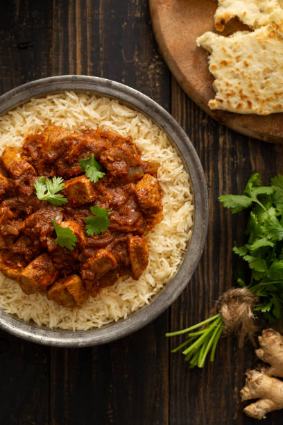 istock Indian Food Chicken Vindaloo Curry over Basmati Rice 1165889530