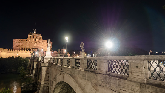 Rome 2019. Castel Sant'Angelo and Ponte Sant'Angelo. We are at night and many tourists stroll admiringly the beauty of the monument. July 2019 in Rome.