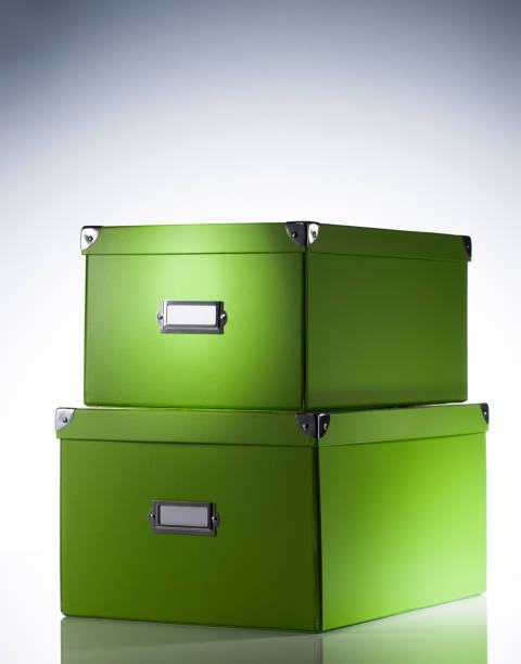 boîte de rangement verte. - cumulate photos et images de collection