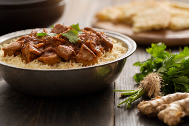 istock Indian Food Chicken Vindaloo Curry over Basmati Rice 1165894044