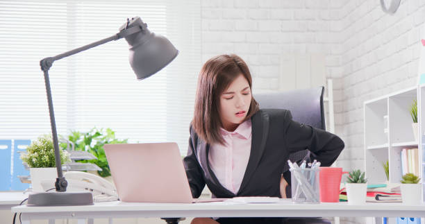 istock Asia businesswoman overwork 1165899196