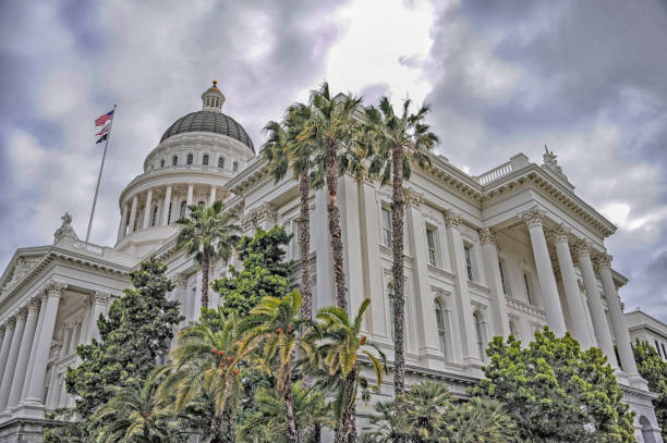 istock California State Capitol Lower View with Flags and Dome 1165899364