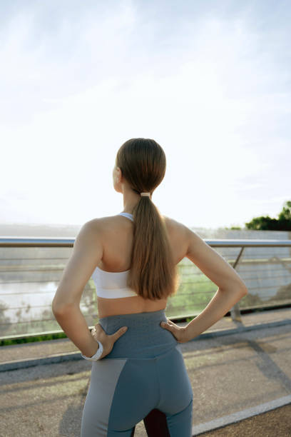 istock Athletic young lady on morning training outdoor 1165900557