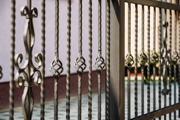 wrought fence wrought iron fence blacksmith shop photos stock pictures, royalty-free photos & images