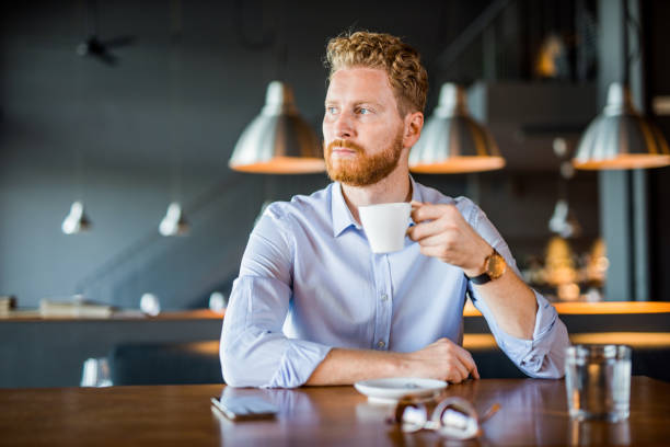 istock Mid adult businessman on a coffee break. 1165905495