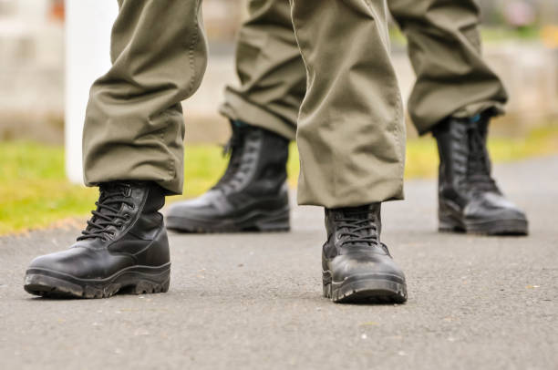 istock Men and women from Republican Sinn Fein, wear paramilitary uniforms 1165906864