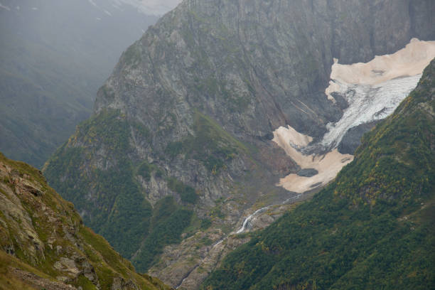 istock Fascinating ascent in the mountains of Dombai. Karachay-Cherkessia 1165911708