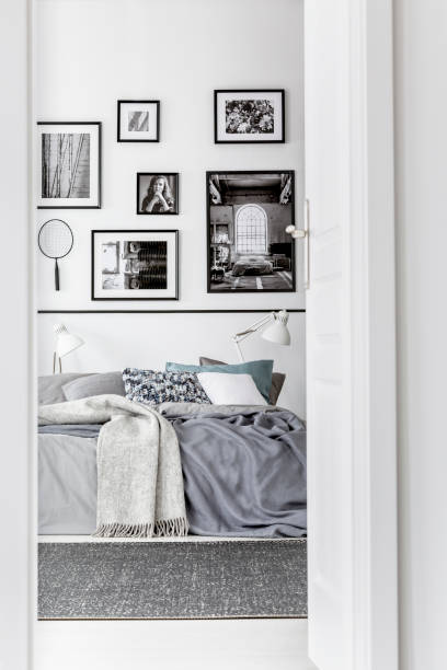 istock Trendy bedroom with comfortable king size bed in modern flat, real photo 1165917446
