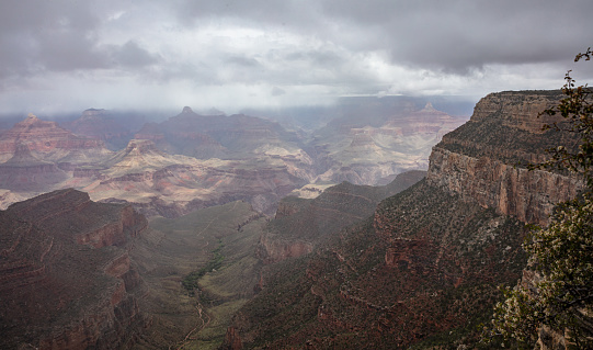 Grand Canyon National park, Arizona, United States. Overlook of the red rocks, cloudy sky background