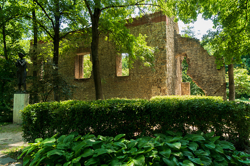 Budapest, Hungary - July 08, 2019: The Margaret Island on the Danube, between Buda and Pest, is a quiet green area of the city. Hidden by the vegetation inside the island are the ruins of the monastery founded by the Giovanniti knights.