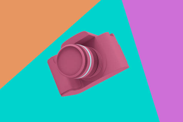 camera on pastel background. pop art - photographer enjoyment elegance old fashioned imagens e fotografias de stock