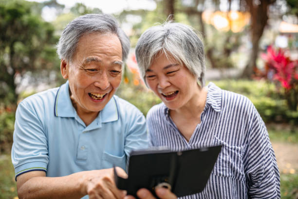 istock Senior couple having a video call over smartphone 1165931710