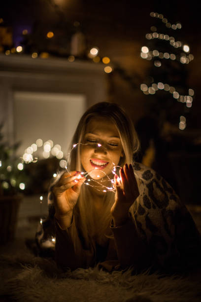 istock Christmas lights and home 1165933423