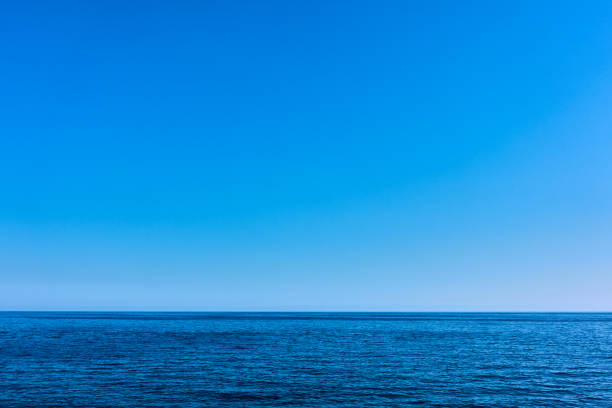 istock Seascape with sea horizon and blue sky 1165935583