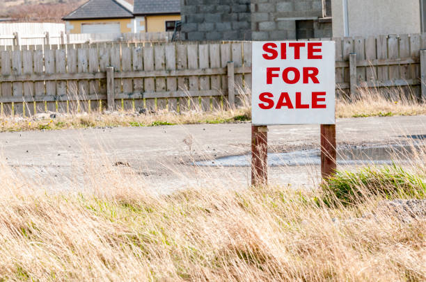 istock Sign for a building site for sale. 1165938116
