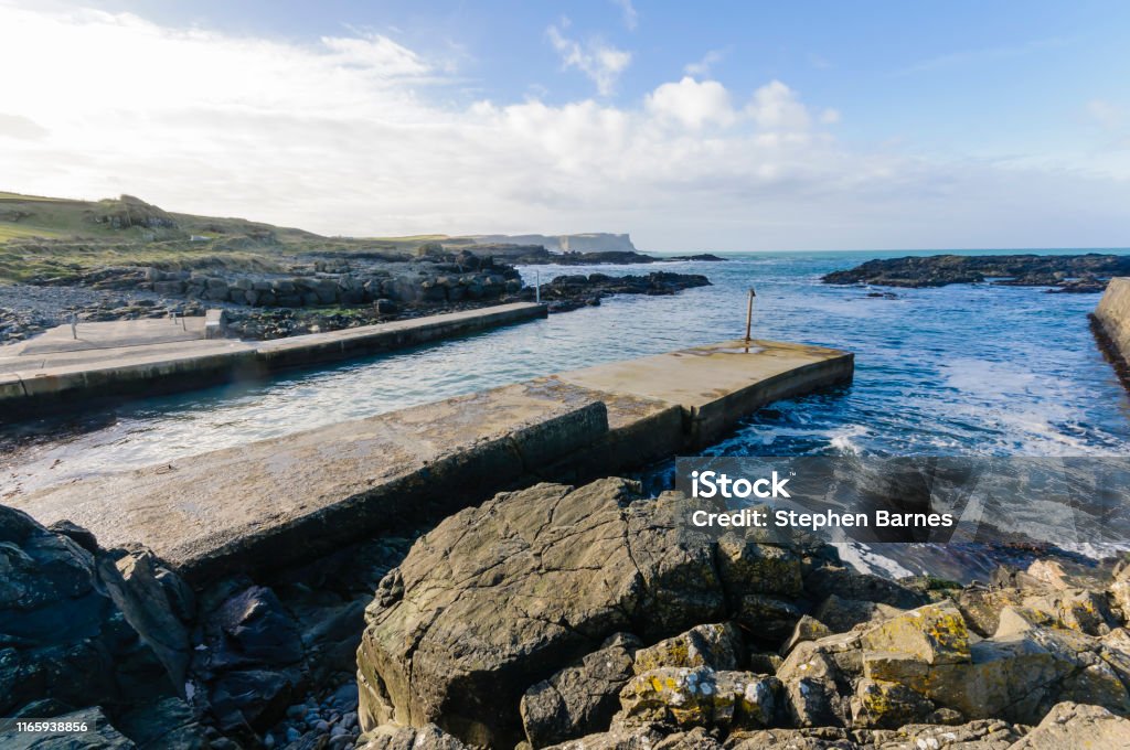 Dunseverick Harbour, County Antrim, Northern Ireland. Boardwalk Stock Photo