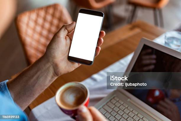 Getting The Most Out Of The Work Day With Technology Stock Photo - Download Image Now