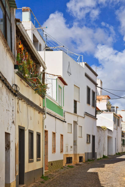 istock Old traditional portuguese street 1165943748