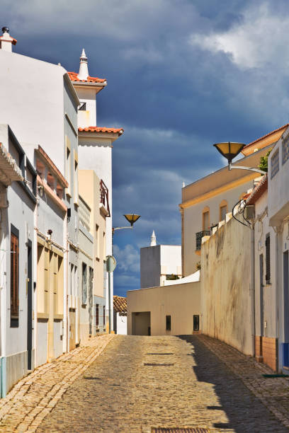 istock Old traditional portuguese street 1165943757