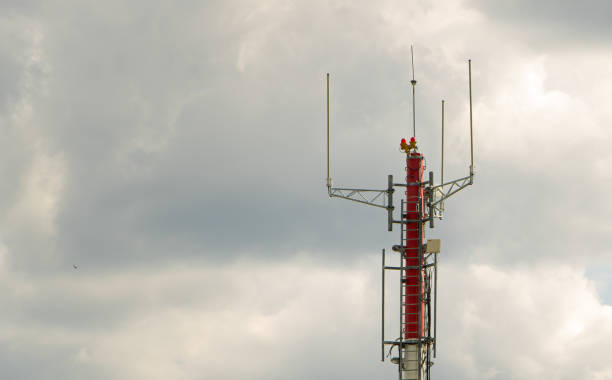 istock Telecommunication tower on the cloudy sky. Communication technology 1165954290