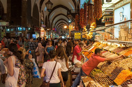 Istanbul, Turkey - August 27, 2013: Crowd of multi-ethnic people shopping at Grand Bazaar market in Istanbul