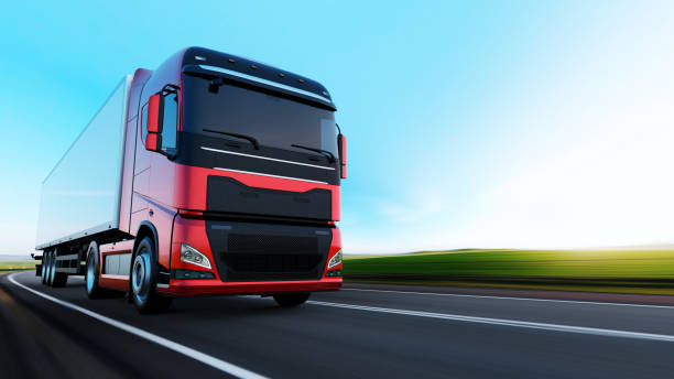 istock semi-truck with trailer driving on road 1165957193