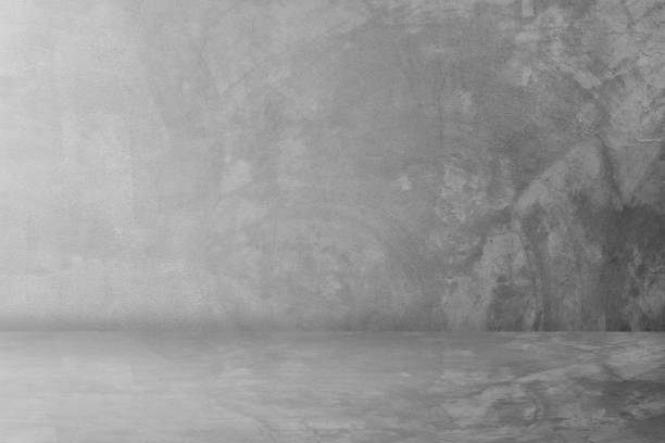 istock black cement studio and dark showroom background for present products 1165962485