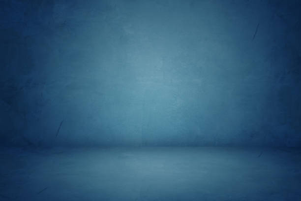 istock blue cement studio and dark showroom background for present products 1165962514