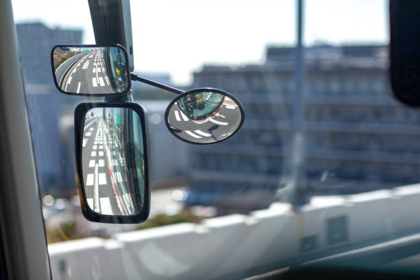 istock Rear-view mirror in the bus riding on a freeway, Japan 1165965417