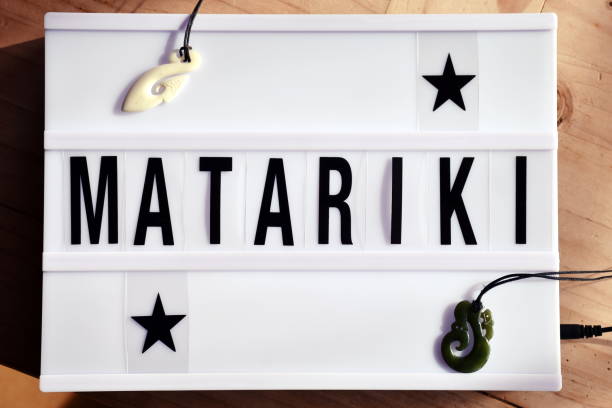 Matariki Word Meaning New Year in Maori Te Reo in Light Box Trend Light Box Trend in a Maoritanga Theme. Te Reo (Maori Language) that every Kiwi or New Zealander should know. Matariki is the Maori New Year Celebration. Matariki actually means the cluster of stars Pleiades (or seven sisters) which marks the beginning of a New Year when they arrive in the sky. The New Year is a time to plant your new crops for the coming New Year ahead. the pleiades stock pictures, royalty-free photos & images