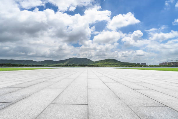 istock Empty square floor and blue sky nature landscape 1165983891