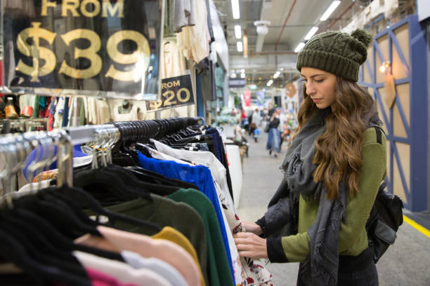 istock Clothes Shopping at the Market 1165990588