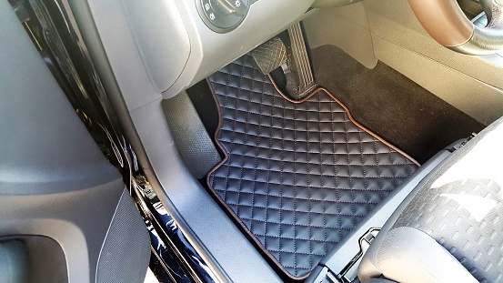 a car mat, handmade leather mat appearance