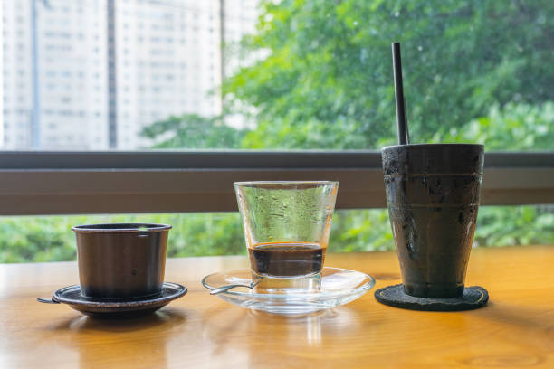 istock Vietnamese coffee with cityscape and garden background in Saigon 1165993707