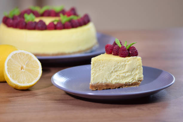 istock Slice of New York Cheesecake decorated with fresh raspberries. 1165999832