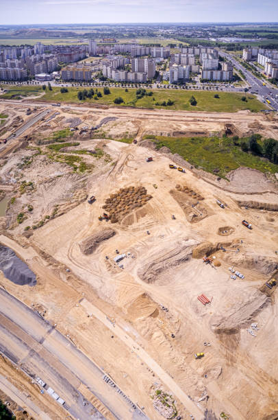 istock panoramic drone image of city suburbs construction site 1166001668