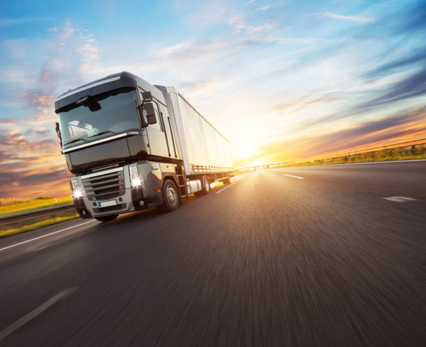 istock European truck vehicle with dramatic sunset light 1166002824