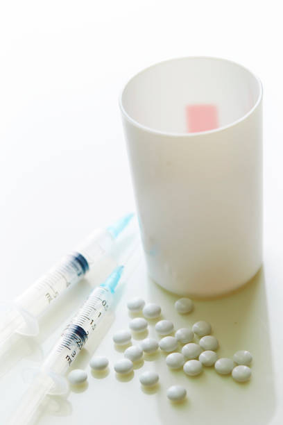 istock Medicine and syringe 1166004230