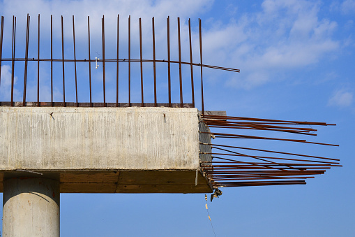 Fragment of the construction of an automobile bridge over the road