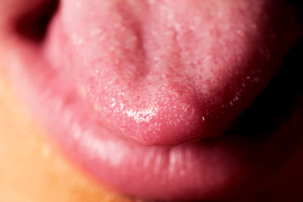 istock Close up shot of a tongue. 1166007761