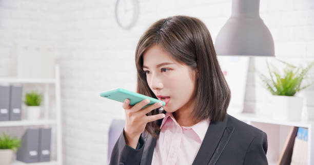 istock Businesswoman use audio assistant 1166008836