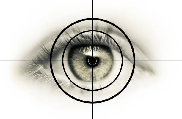 Young Eye in the cross hairs Young Eye in the cross hairs female sharp shooter stock pictures, royalty-free photos & images