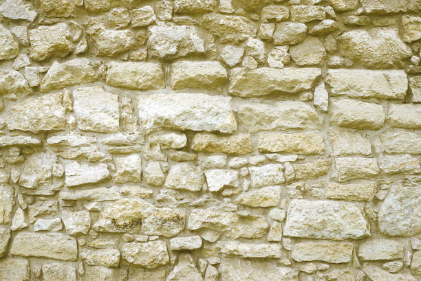 istock Beige stone mosaic wall background 1166010535