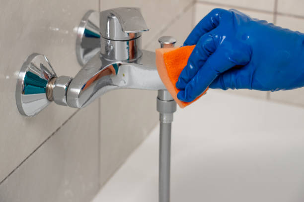 istock Plumbing fixtures cleaning process from limescale 1166010585