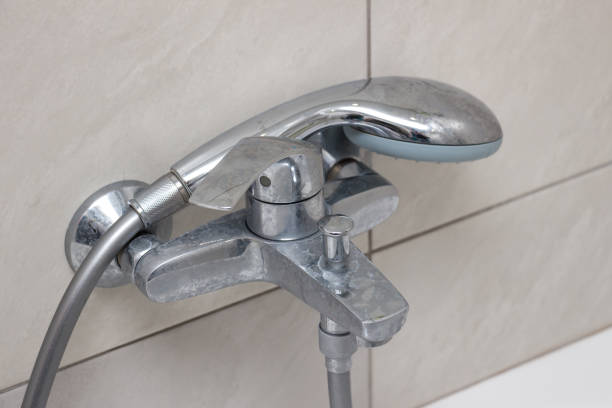 istock Plumbing fixtures cleaning process from limescale 1166010594